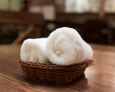 Two white refreshment towels , Elegance collection