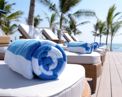 Luxury rolled blue striped towels