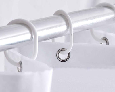 zoom image of white shower curtain with metal grommets and plastic hooks
