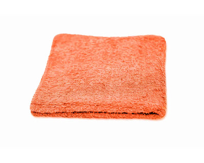 orange serged terry cloth with white background