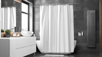 white nylon shower curtain with metal rust-proof grommets hanging in bathroom