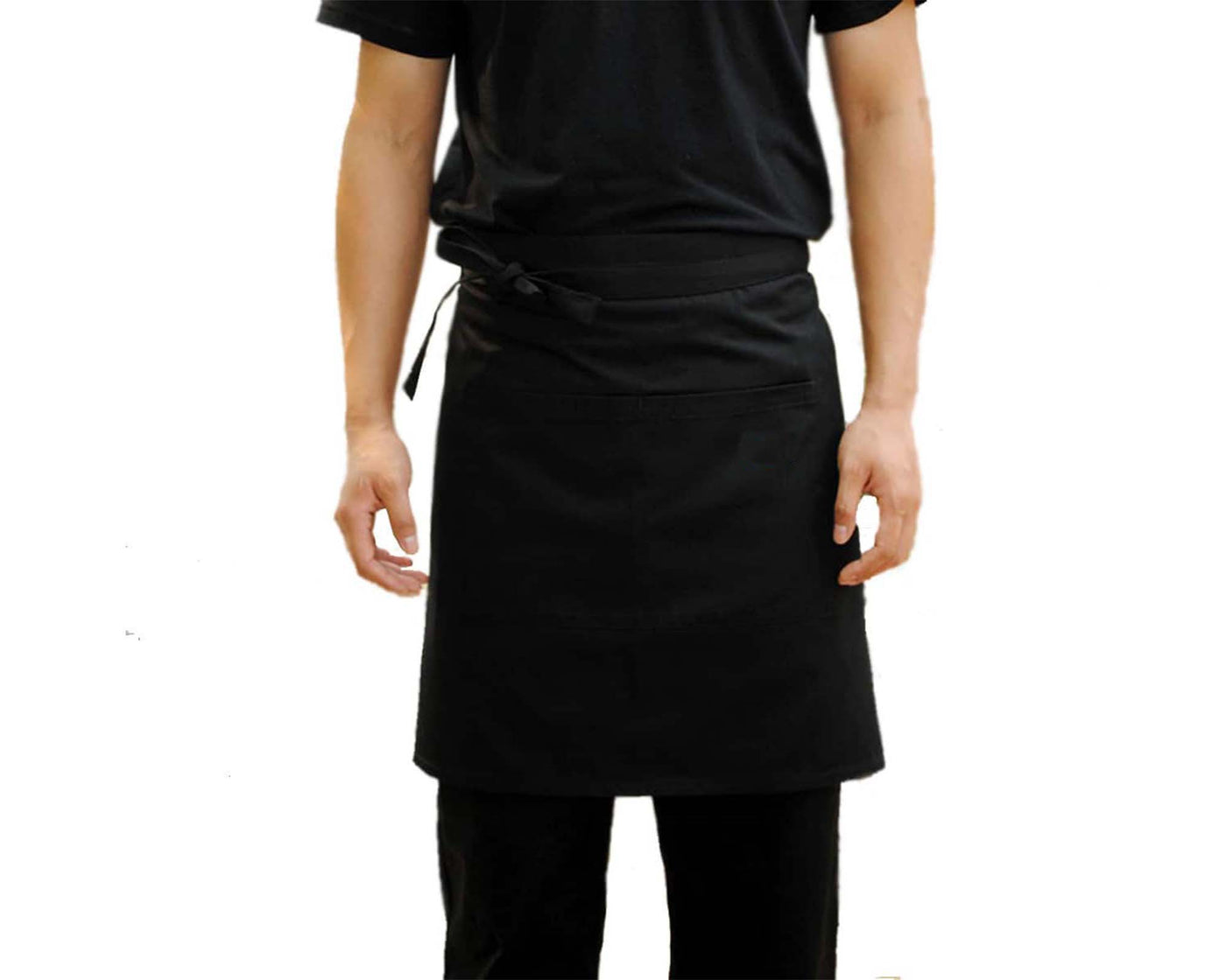A person is wearing IHOP Apron without logo,  Showing the apron how its folded up.