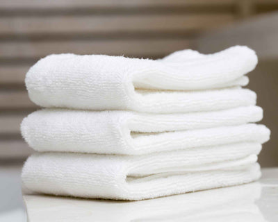 Pile of #white face cloths