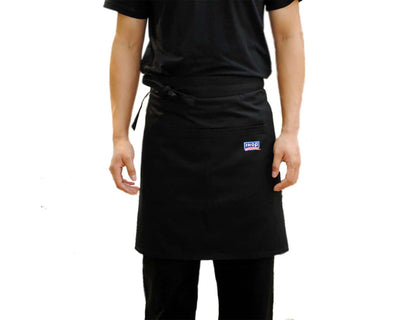 man wearing reversible IHOP apron with IHOP logo 