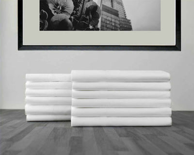 pile of T200 white pillowcases pack by 12 pcs