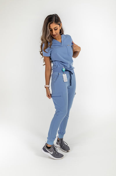 Vena ladies jogger style scrub lady showing  side pocket with zipper#colour_ceil-blue