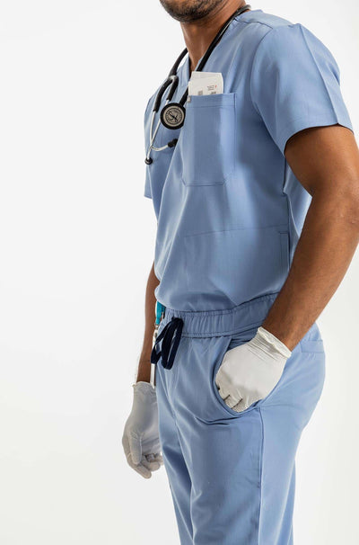 Vena mens jogger scrub pants man showing side pocket of the scrub pant#colour_ceil-blue